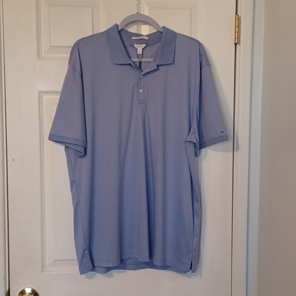 Calvin Klein polo shirt, size XL.